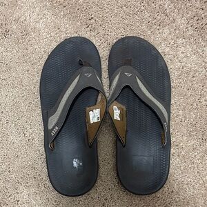 Reef Men’s Black and Gray Toe-Post Flip Flops